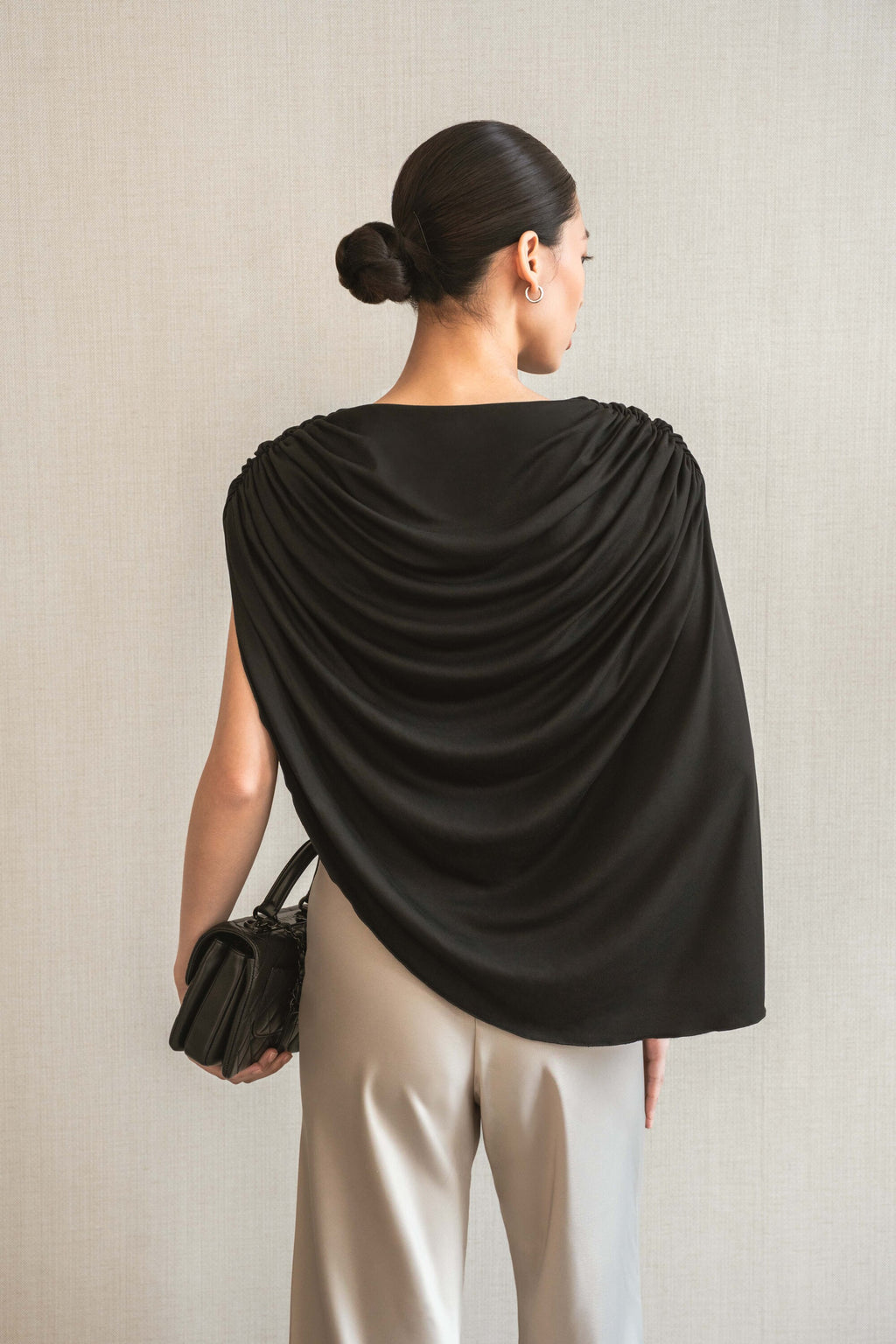 GATHERED ARC KNIT TOP